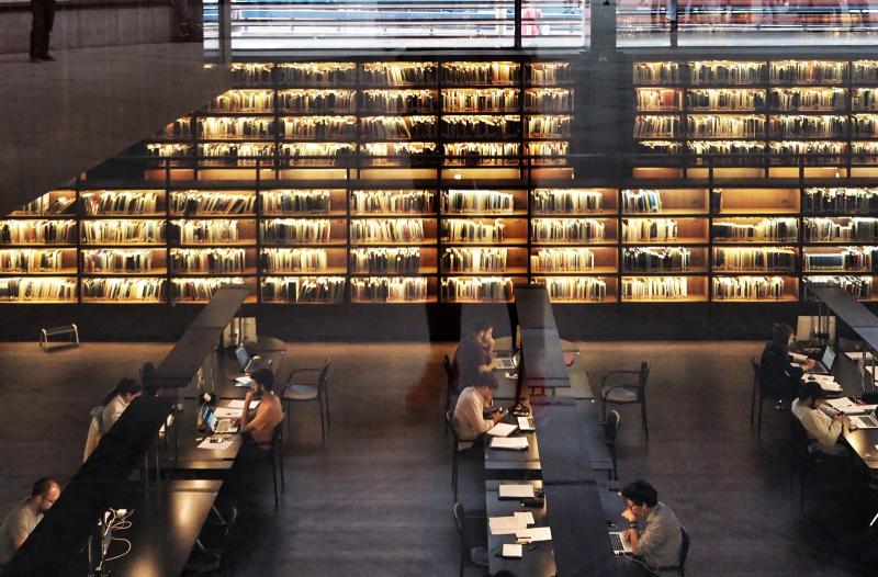 view-from-above-looking-down-on-students-studying-in-library